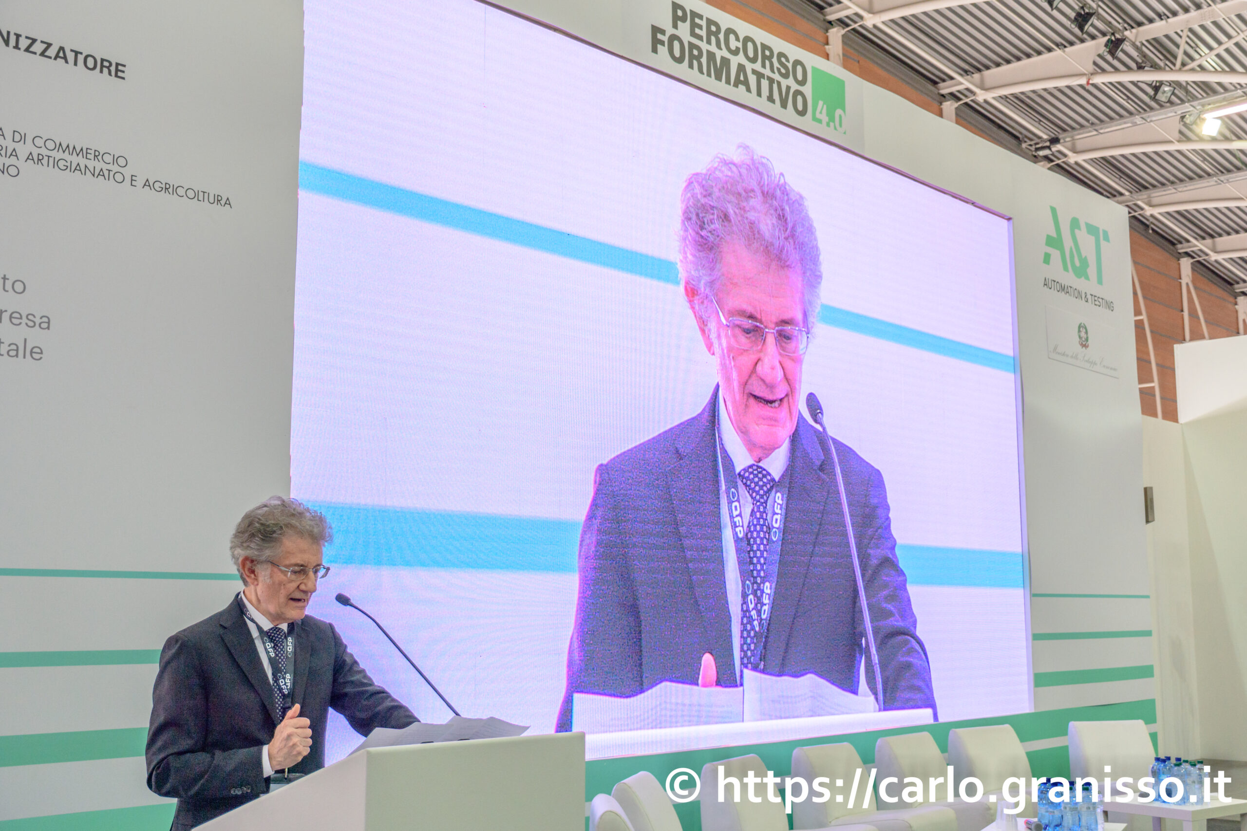 Luciano Malgaroli, presidente e creatore di A&T Automation & Testing, mentre tiene un discorso durante l'evento presso l'Oval Lingotto di Torino.